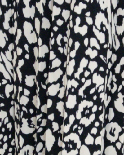 Jupe femme mi-longue léopard noire et écrue
